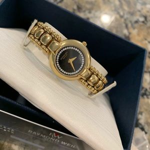 Raymond Weil Parsifal gold electroplated w/diamonds.Works, in perfect condition
